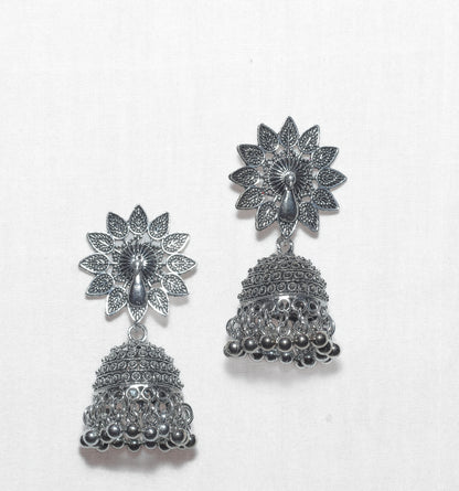Jhumka with a peacock motif in the center